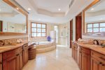 Large beautfifully appointed master bathroom with tub, shower and outdoor shower